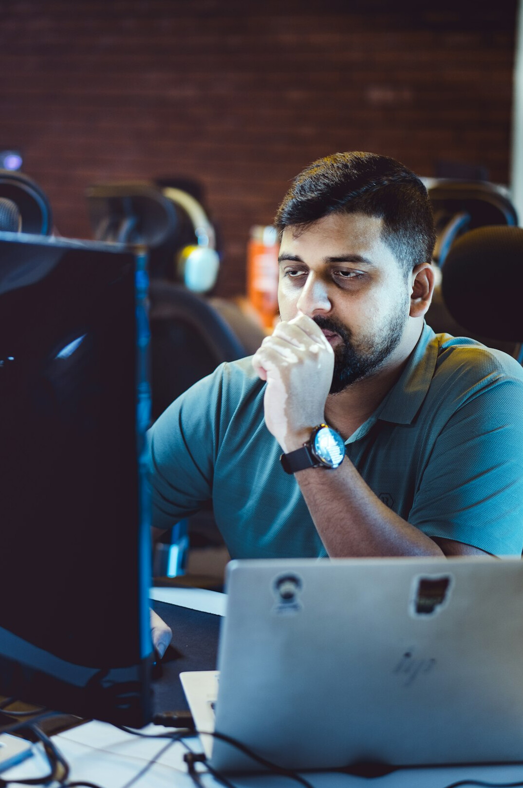 programmer coding at desk